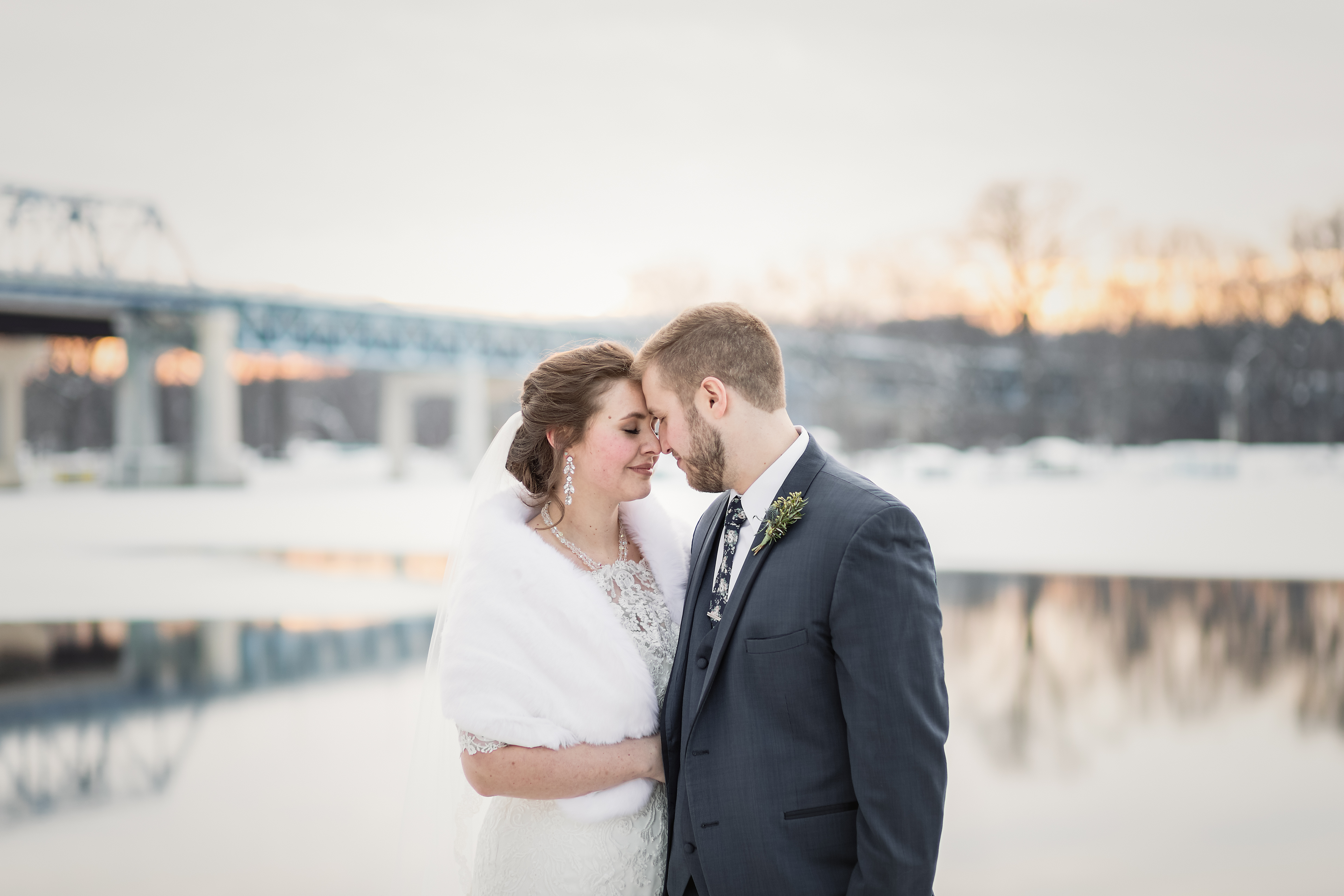 Romantic Pink and Navy Winter Wedding at The Cargill Room in The Waterfront Restaurant La Crosse, WI | © Pink Spruce Photography | www.pinksprucephotography.com